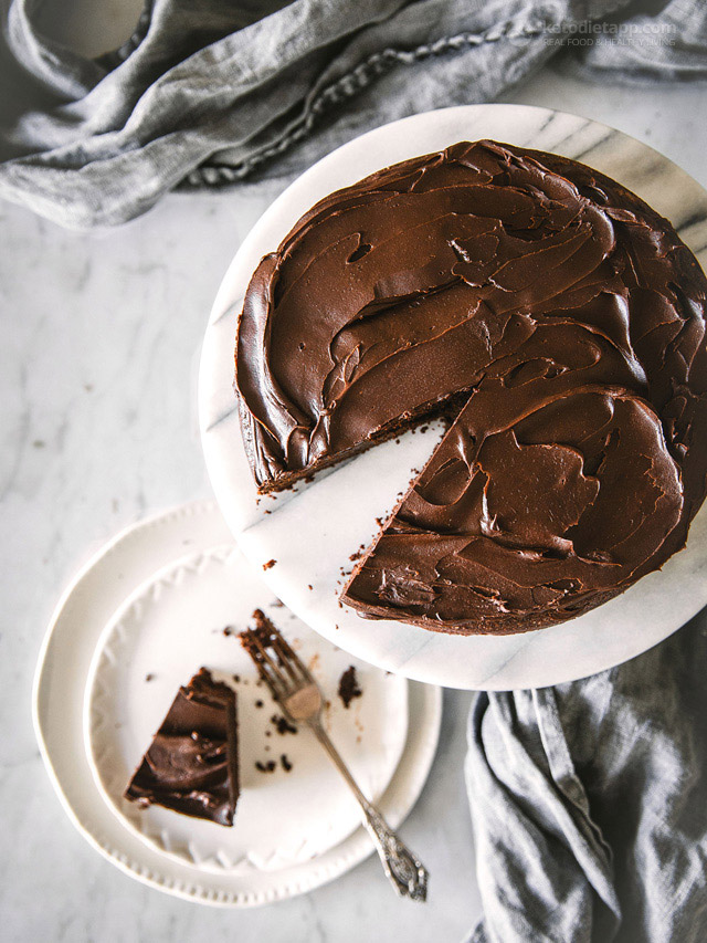 Keto chocolate cake topped with rich dark chocolate frosting