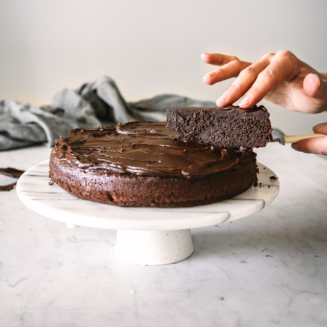 Homemade low-carb chocolate cake with thick chocolate ganache